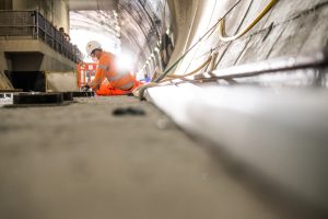 construction photography of man working in tunnel
